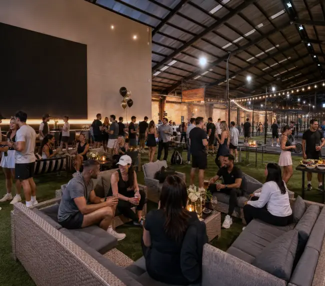 Corporate group or birthday party setup at K.O.P. — King’s Tavern in background. 
